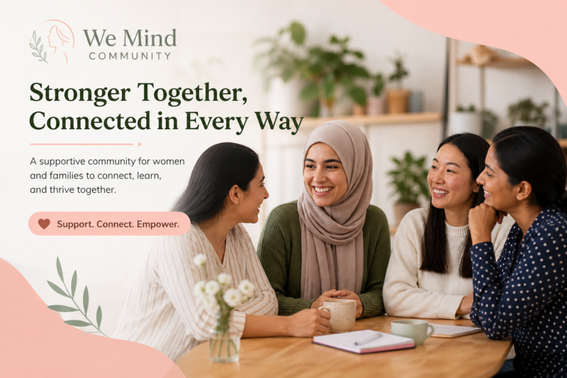 Group of multicultural women sitting together, smiling and talking in a supportive community setting